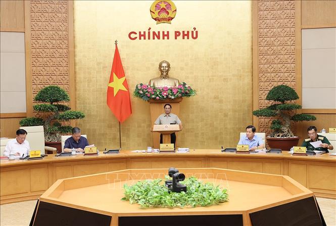 The Prime Minister chairs a Government meeting on law-making. Photo: VNA