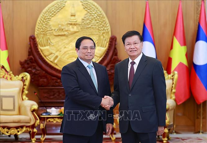 Prime Minister Pham Minh Chinh meets with General Secretary and President of Laos