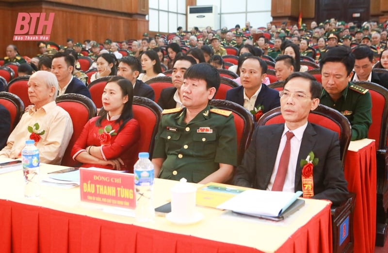 Meeting to celebrate the 75th anniversary of the traditional day of Vietnamese volunteer soldiers and military experts helping the Lao revolution