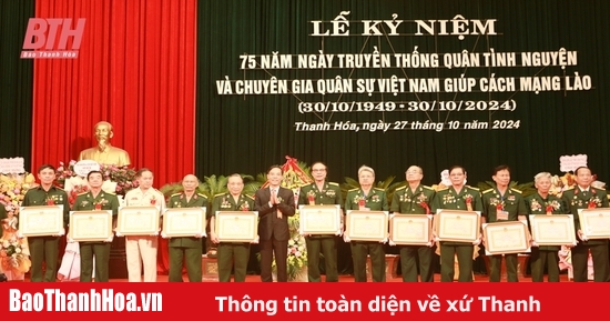 Meeting to celebrate the 75th anniversary of the traditional day of Vietnamese volunteer soldiers and military experts helping the Lao revolution