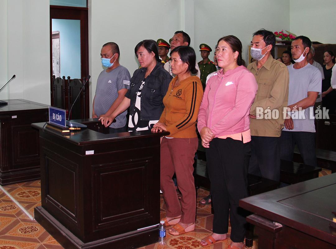 The defendants listened to the jury's verdict.