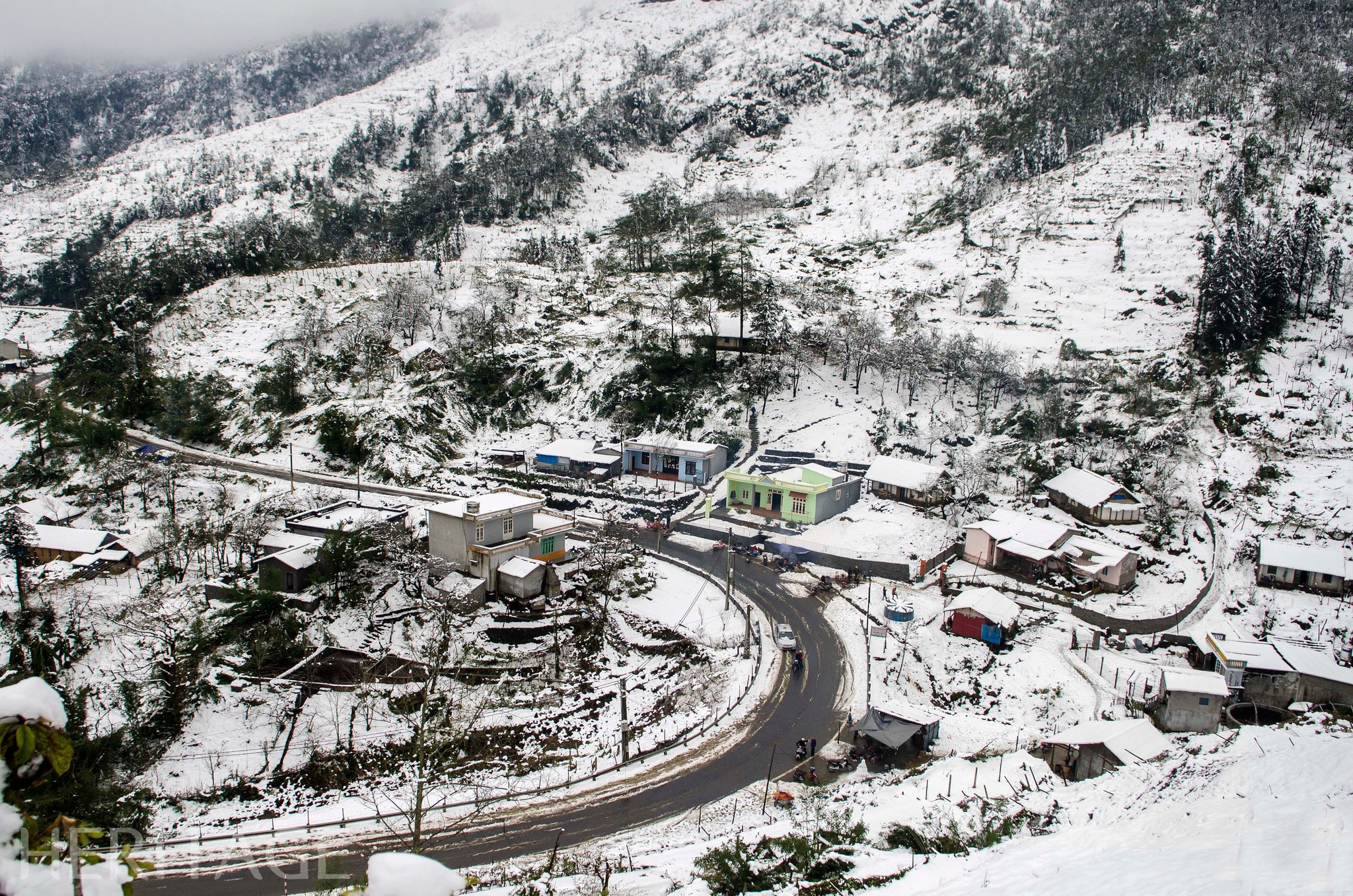 Maybe a picture of a ski slope and a road