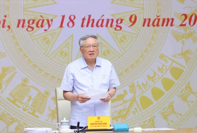 Le vice-Premier ministre permanent Nguyen Hoa Binh prend la parole. (Photo : Pham Kien/VNA)