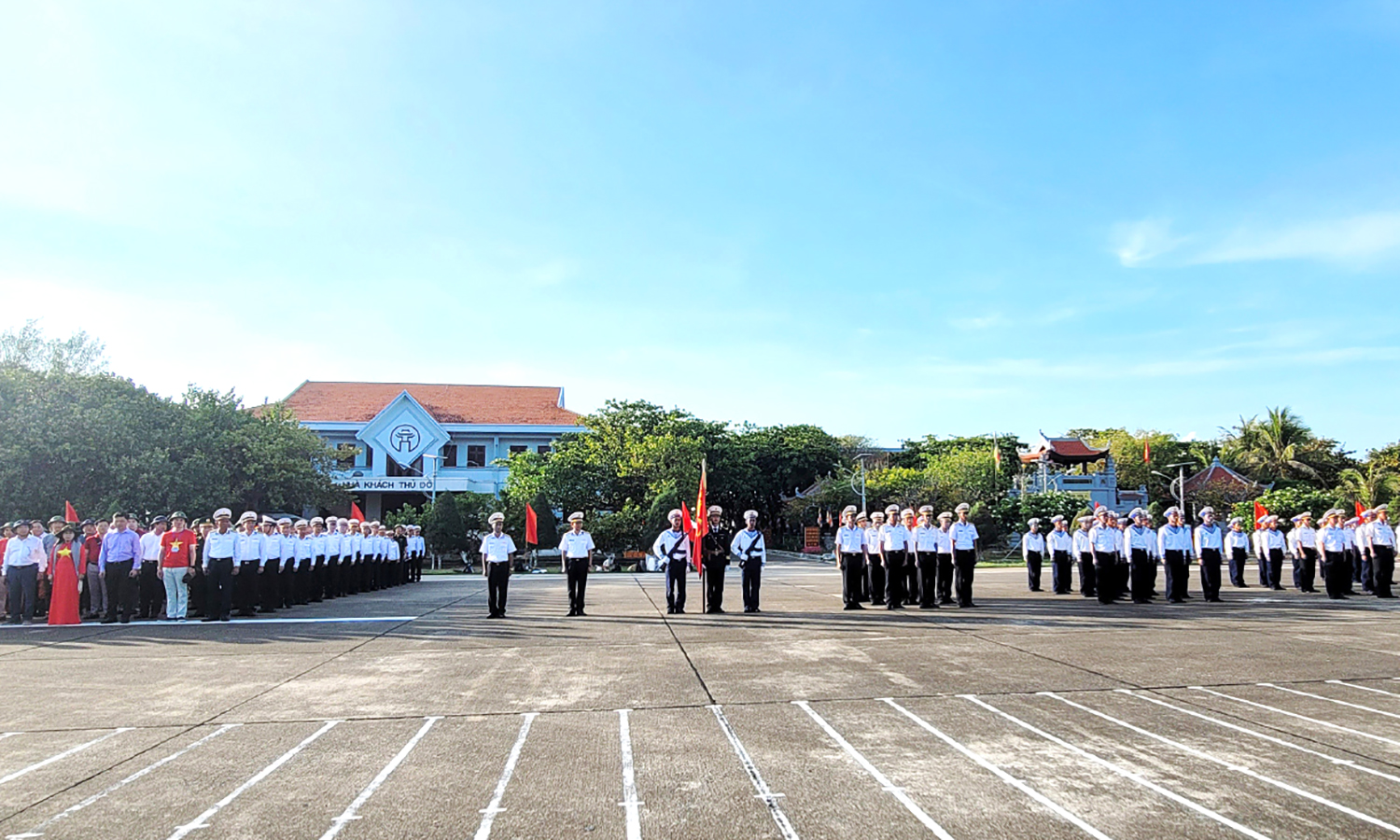 The national flag flies on the crest of the waves