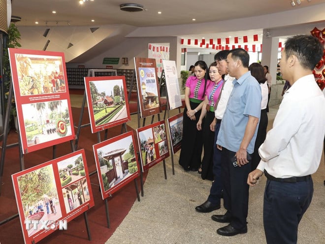 ttxvn-dien-bien-trien-lam-anh-chuyen-de-noi-bac-dung-chan-truong-duc-thanh-phan-thiet2.jpg