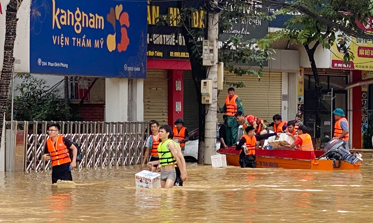 Many support groups waded in the water to support people.