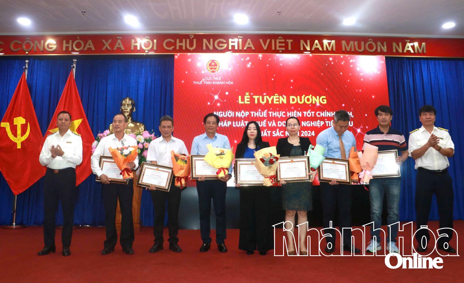 Provincial Tax leaders awarded certificates of merit to businesses