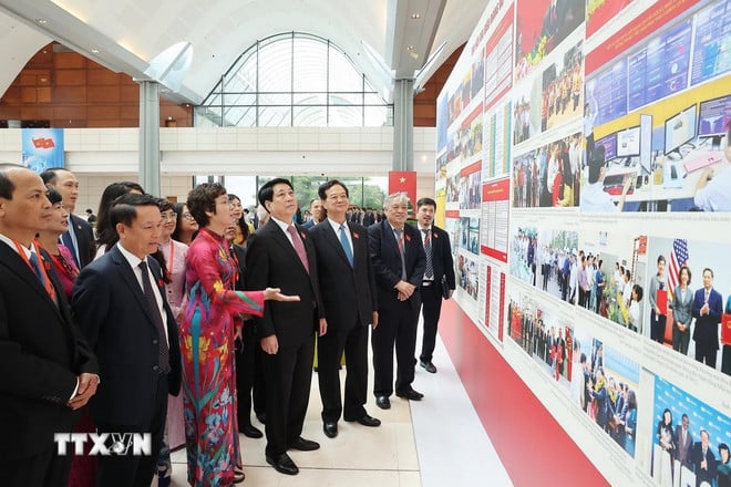 ttxvn-chu-tich-nuoc-tham-quan-trung-bay-anh-cua-2.jpg