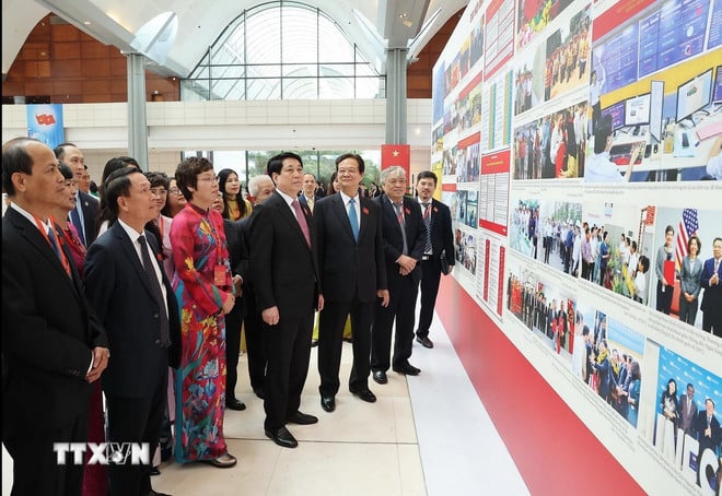 ttxvn-chu-tich-nuoc-tham-quan-trung-bay-anh-cua-3.jpg