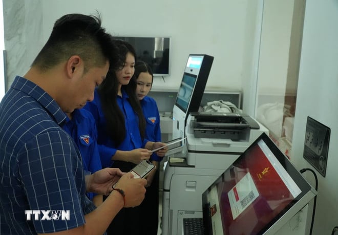 ttxvn-chinh-quyen-dia-phuong-2-cap-o-sieu-do-thi-tp-ho-chi-minh-1410-3.jpg