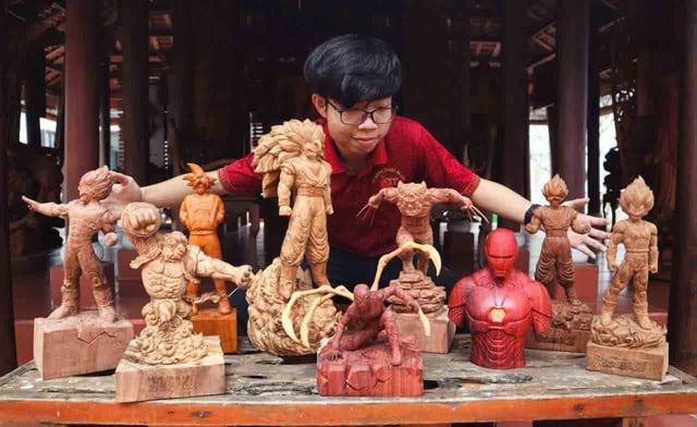 Geschichte eines Kunsthandwerkers der Generation Z: Tran Duys Welt der Holzskulpturen – Foto 3. Chuyện nghệ nhân gen Z: Thế giới tượng gỗ của Trần Duy- Ảnh 3.