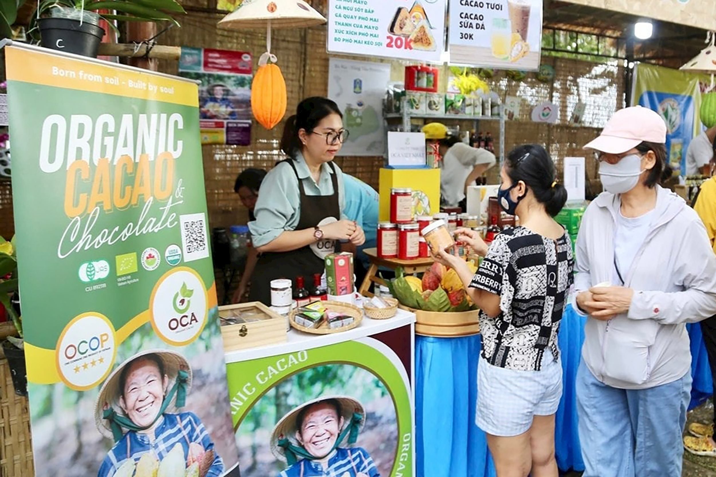 booths selling opiap products and traditional music of Chau Duc district, Ba Ria Vung Tau province.jpg