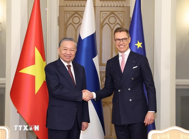 ttxvn-tong-bi-thu-ky-ket-van-kien-hop-tac-phan-lan-4.jpg