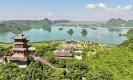 Play golf at Legend Valley Country Club, visit Tam Chuc Pagoda