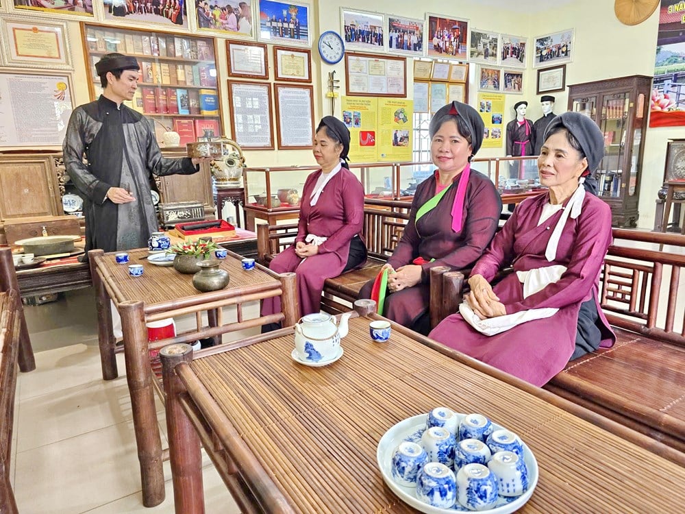 Entdecken Sie den Ort, der die Schönheit, Liebe und den Charme von Quan Ho bewahrt – Foto 1