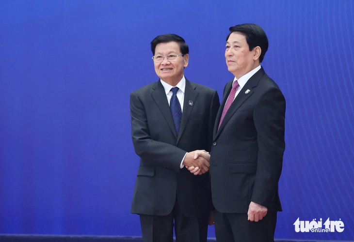 Chủ tịch nước Lương Cường đón lãnh đạo các nước, tổ chức tham dự lễ mở ký Công ước Hà Nội - Ảnh 2.