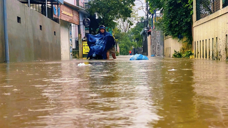 MƯA LỚN - Ảnh 1.