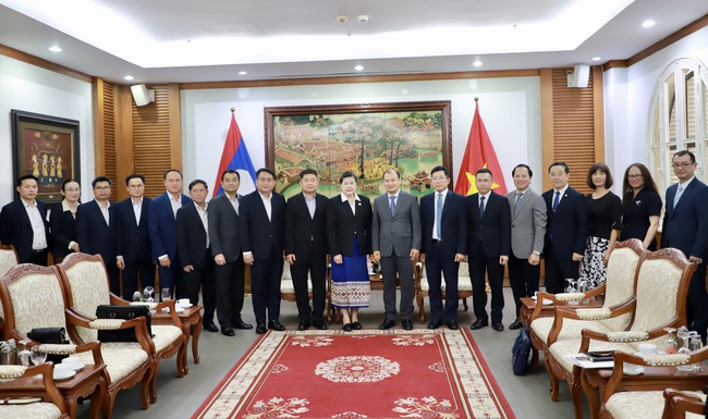 Thứ trưởng Thường trực Lê Hải Bình tiếp Phó Trưởng ban Tuyên huấn Trung ương Đảng Nhân dân Cách mạng Lào - Ảnh 6.