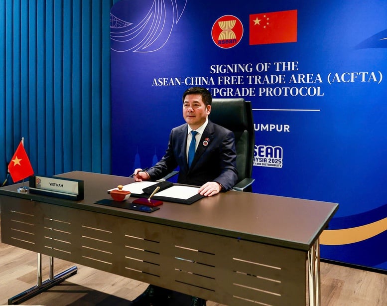 Undertecknande av protokollet för att uppgradera frihandelsavtalet mellan ASEAN och Kina - Foto 1.
