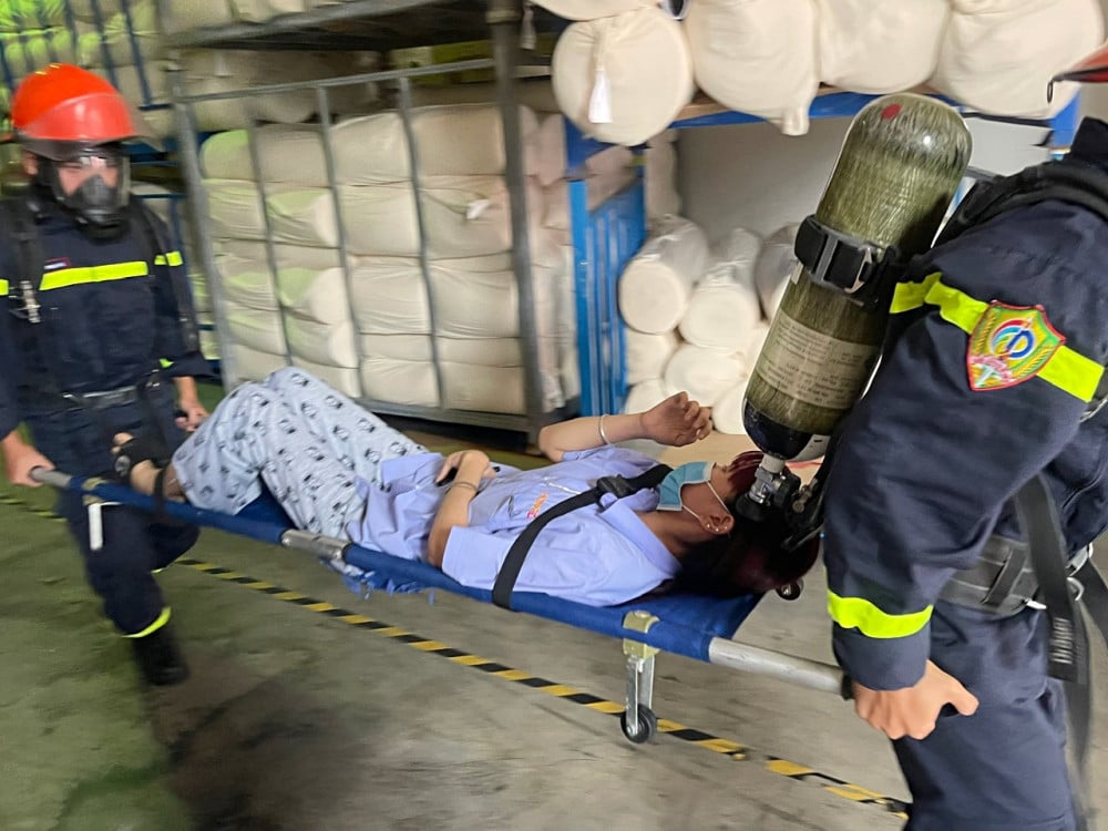 Övning i brandbekämpning, räddning och hjälpplaner på HONGDA Textile Company Limited