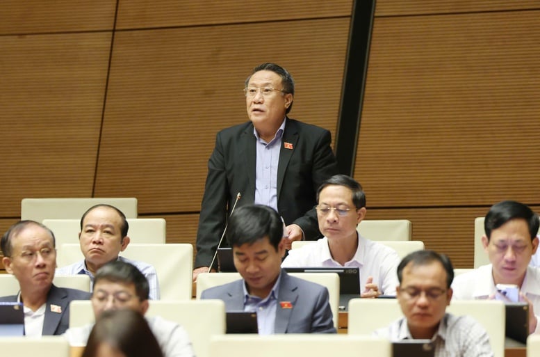 ບັນດາຜູ້ແທນສະພາແຫ່ງຊາດສະເໜີຫຼາຍວິທີແກ້ໄຂເພື່ອເສີມຂະຫຍາຍລະບົບການເງິນແຫ່ງຊາດ ແລະ ຍົກສູງປະສິດທິຜົນການລົງທຶນພາກລັດ - ຮູບ 2. Đại biểu Quốc hội đề xuất nhiều giải pháp củng cố nền tài chính quốc gia, nâng cao hiệu quả đầu tư công- Ảnh 2.