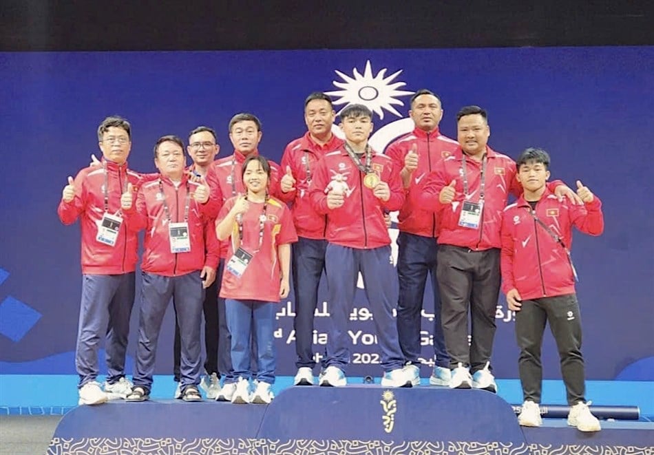 អ្នកលើកទម្ងន់វៀតណាមប្រកួតដោយជោគជ័យក្នុងព្រឹត្តិការណ៍ Asian Youth Games ឆ្នាំ២០២៥ - រូបថត ១