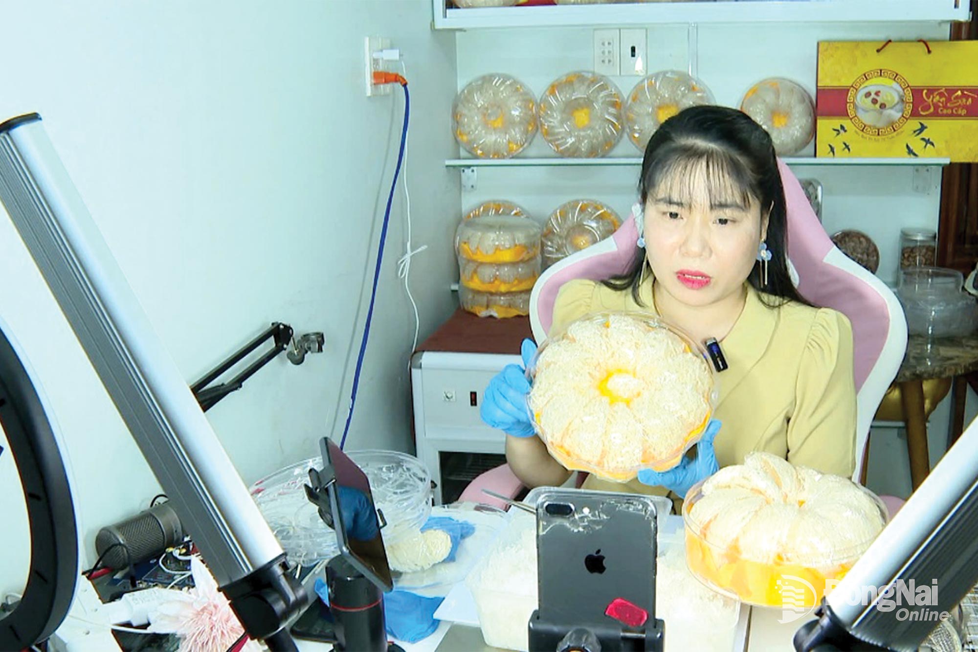 Members of the Dak O Commune Women's Union livestream to sell local agricultural products.