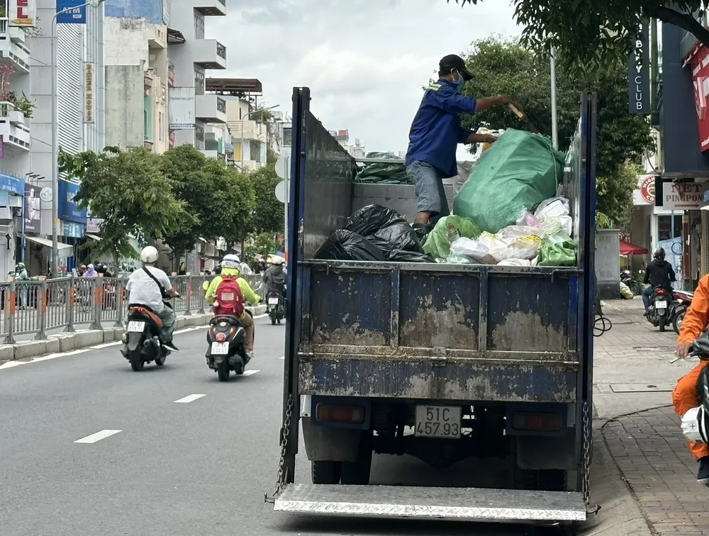Müllabfuhr im Bezirk Hanh Thong, HCMC. Foto: THANH HIEN