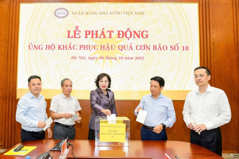 Ngành Ngân hàng chung tay ủng hộ đồng bào bị thiệt hại do bão số 10- Ảnh 1.