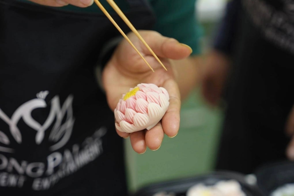 Maquete do Centro de Exposições do Vietnã feita com 510 kg de arroz glutinoso e feijão bate recorde - 3