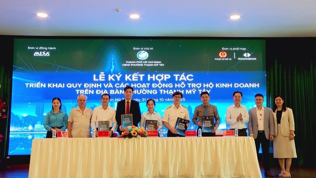 UBND phường Thạnh Mỹ Tây ký kết hợp tác nhiều nơi để hỗ trợ hộ kinh doanh trong khu vực lân cận - Ảnh 2.