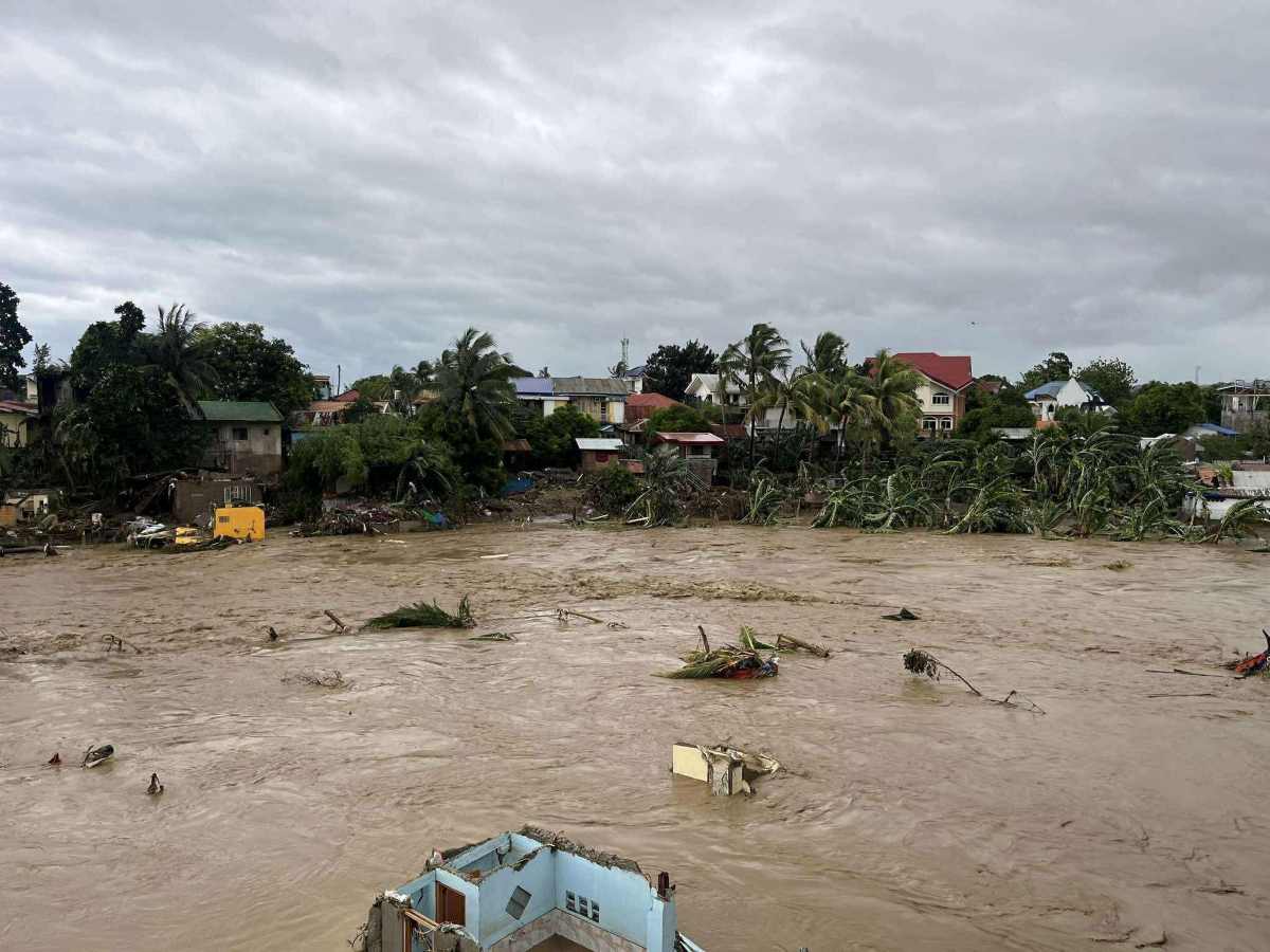 ទឹកជំនន់បន្ទាប់ពីព្យុះទីហ្វុងលេខ 13 បានបំផ្លាញផ្ទះជាច្រើននៅ Sitio Isla Verde, Barangay San Isidro, Talisay, Cebu ។ រូបថត៖ ប្រព័ន្ធអាកាសធាតុហ្វីលីពីន/បច្ចុប្បន្នភាពព្យុះប៉ាស៊ីហ្វិក