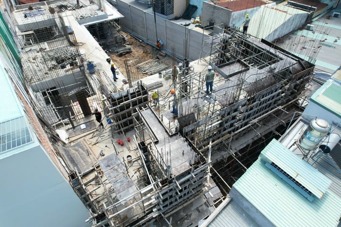 Thuế bất động sản phải công bằng, đừng đánh nhầm người mua ở thật - Ảnh 1.