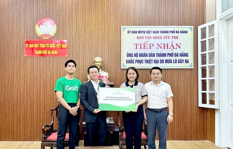 Grab Việt Nam hỗ trợ tài xế tại Huế, Đà Nẵng chi phí sửa xe ngập nước - Ảnh 2.