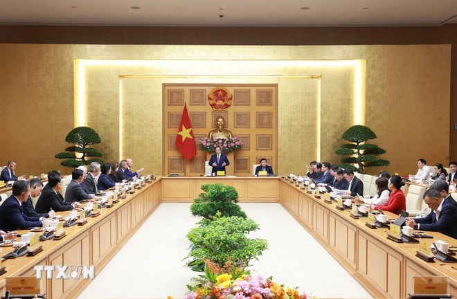 ttxvn-thu-tuong-tar-mot-en-grupp-ledare-för-internationella-medborgarföretag-7.jpg