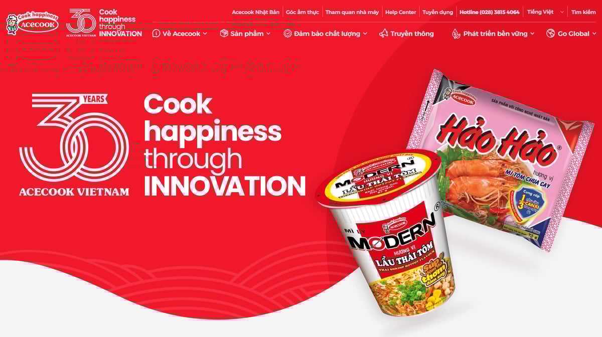 គេហទំព័រប្រើប្រាស់ពណ៌ក្រហម និងសជាពណ៌ចម្បង ដែលបង្ហាញយ៉ាងច្បាស់អំពីអត្តសញ្ញាណនៃអាជីវកម្ម។ រូបថត៖ Acecook Vietnam។ Website sử dụng tông màu chủ đạo đỏ - trắng, thể hiện rõ bản sắc của doanh nghiệp. Ảnh: Acecook Việt nam.