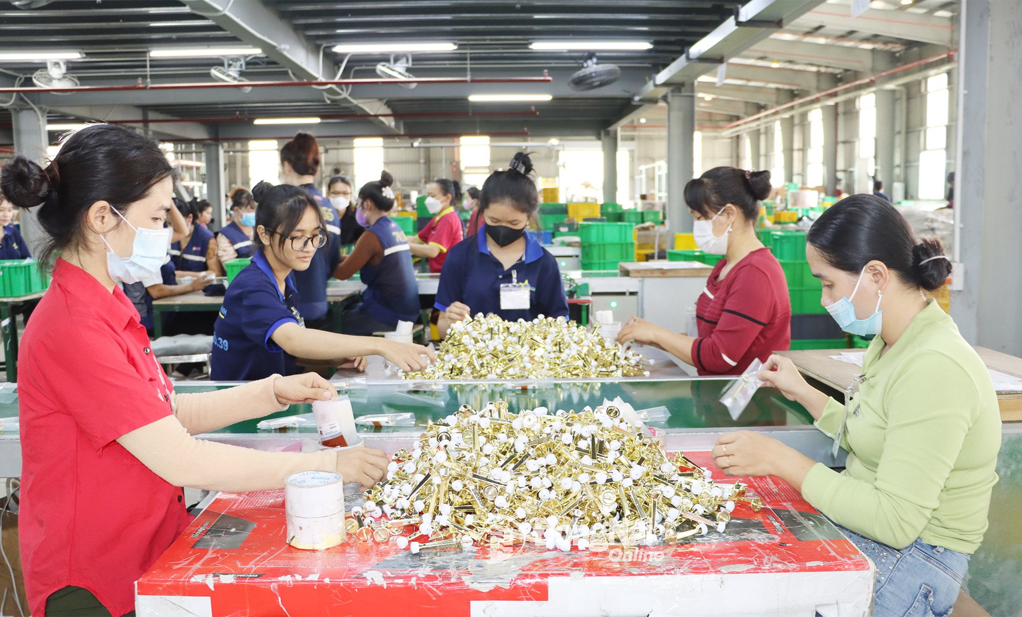 Arbetare vid Minh Hung - Sikico Industrial Park, Tan Khai kommun, Dong Nai-provinsen under arbetstid. Foto: Vu Thuyen