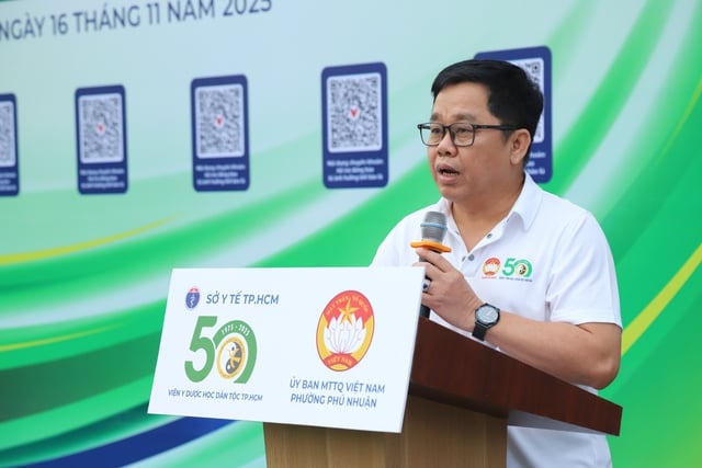 ເກືອບ 2.000 ຄົນ ອອກກຳລັງກາຍເພື່ອສຸຂະພາບຊຸມຊົນ - ຮູບ 1. Gần 2.000 người đồng diễn dưỡng sinh vì sức khỏe cộng đồng- Ảnh 1.