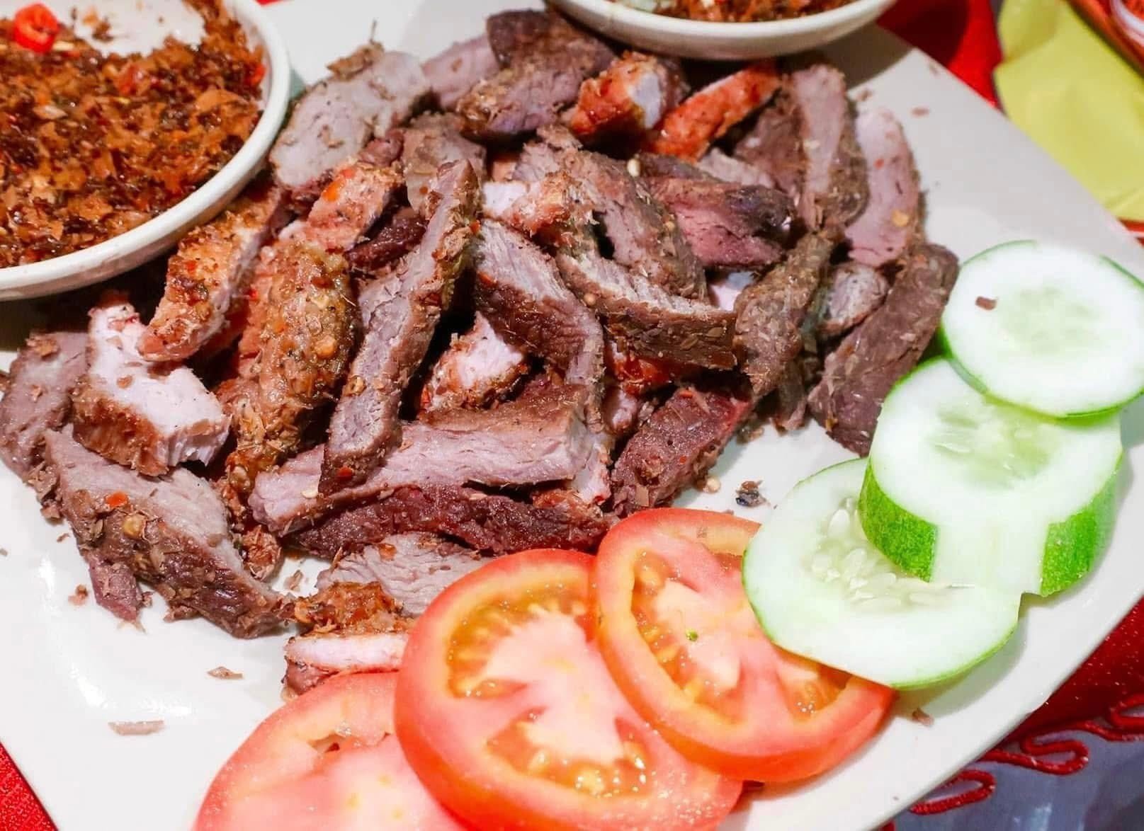 Sun-dried beef product with yellow ant salt of Diep An brand.