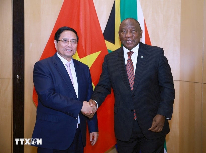 Premiér Pham Minh Chinh se setkal s prezidentem Jihoafrické republiky Matamelou Cyrilem Ramaphosou. (Foto: Duong Giang/VNA)