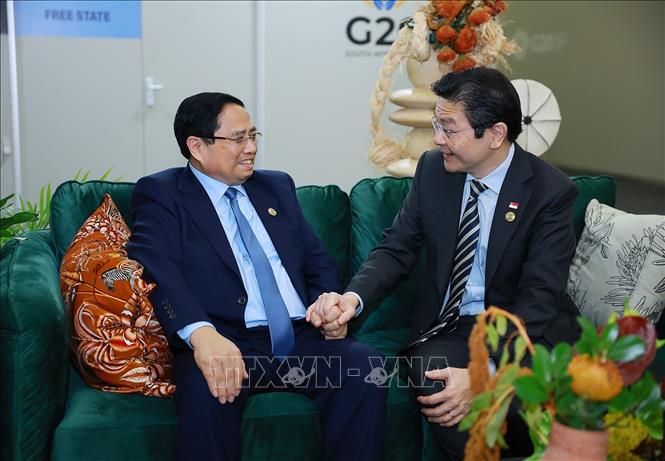 Thủ tướng Phạm Minh Chính gặp Thủ tướng Singapore Lawrence