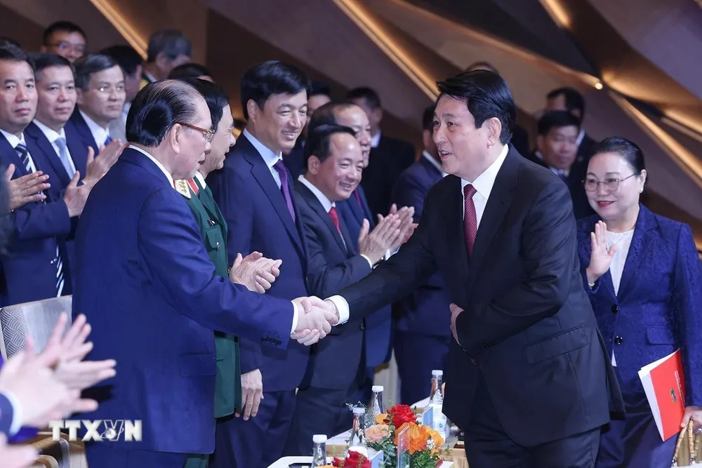 Chủ tịch nước: 50 năm qua là chặng đường lịch sử rực rỡ, vẻ vang của nhân dân các dân tộc Lào - Ảnh 1.