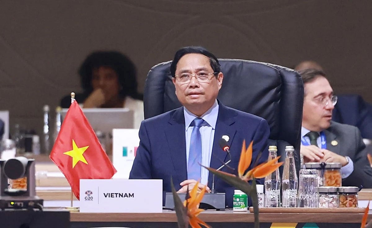 Statsminister Pham Minh Chinh taler på G20-møtet 23. november. Foto: VGP