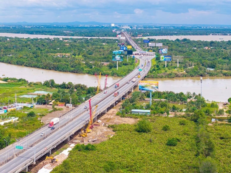 Concessão de 6,750 bilhões de VND em capital de crédito para o projeto de expansão da rodovia expressa Cidade de Ho Chi Minh - Long Thanh - Foto 2. Cấp 6.750 tỷ đồng vốn tín dụng cho dự án mở rộng cao tốc TP.HCM - Long Thành- Ảnh 2.