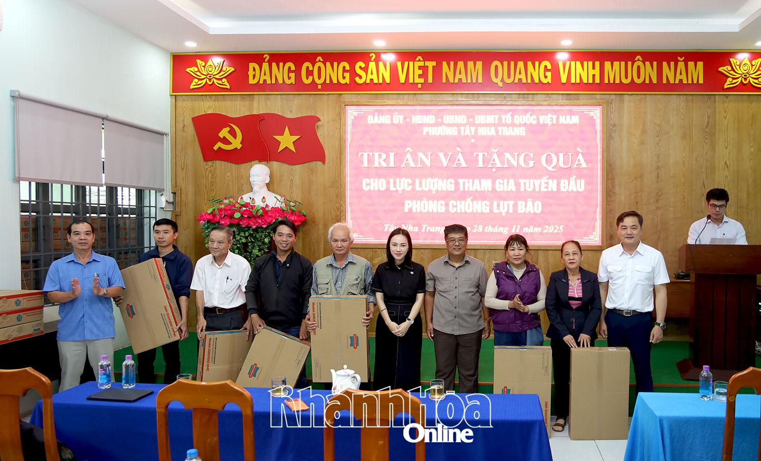 Individuals who are frontline forces in flood and storm prevention receive gifts of gratitude.