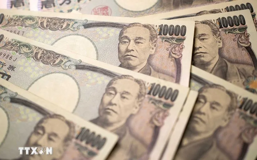 Bancnota japoneză de 10.000 de yeni. (Foto: THX/TTXVN) Đồng tiền mệnh giá 10.000 yen của Nhật Bản. (Ảnh: THX/TTXVN)