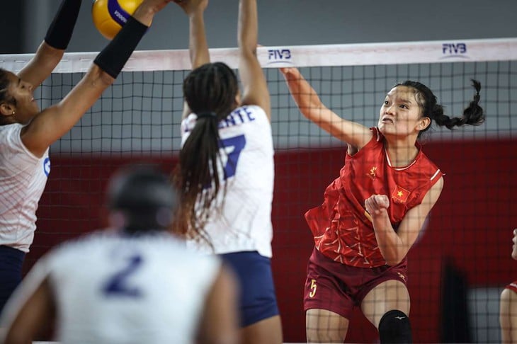 O mundo do voleibol ficou surpreso quando o Vietname convocou uma jovem de 16 anos para substituir Bich Tuyen - Foto 1.