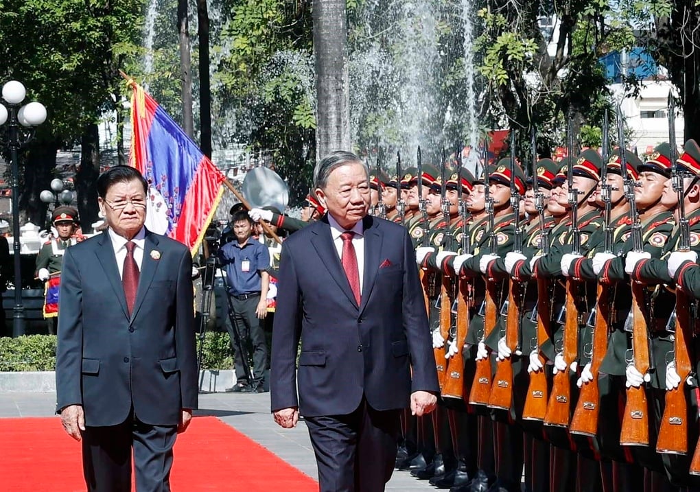Högtidlig välkomstceremoni för generalsekreterare To Lam och hans fru i huvudstaden Vientiane - 1