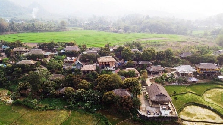 Admire the pristine stilt houses of the Muong people in the tourist village - 2