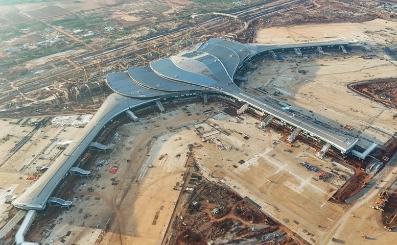 A construção civil aumentou 21,69%, principalmente devido à entrada em fase de aceleração de projetos estratégicos de infraestrutura. Foto: VGP. Xây dựng tăng 21,69%, chủ yếu nhờ các dự án hạ tầng chiến lược đang bước vào giai đoạn tăng tốc. Ảnh: VGP.